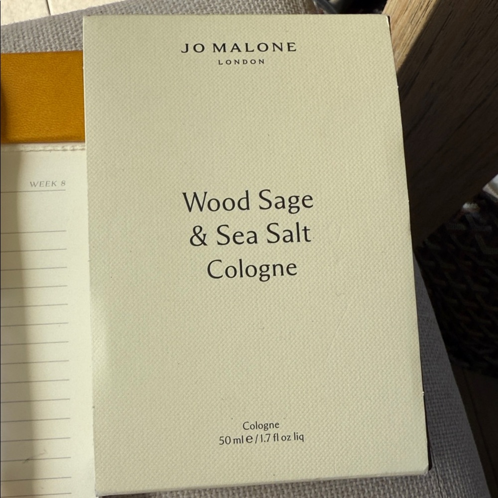 Jo Malone Cream Packaging with Black Jo Malone London Wood Sage and Sea SaltText